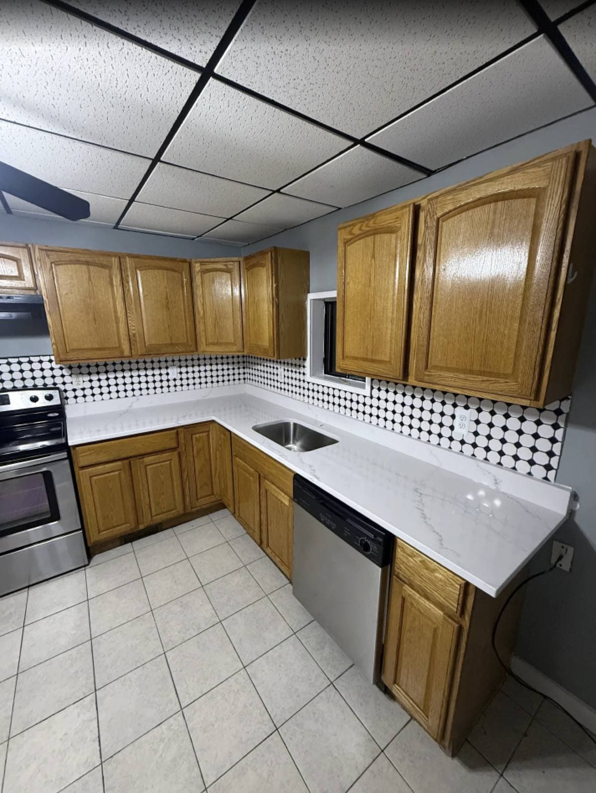 Kitchen with freshly painted cabinets in a Greater Boston home